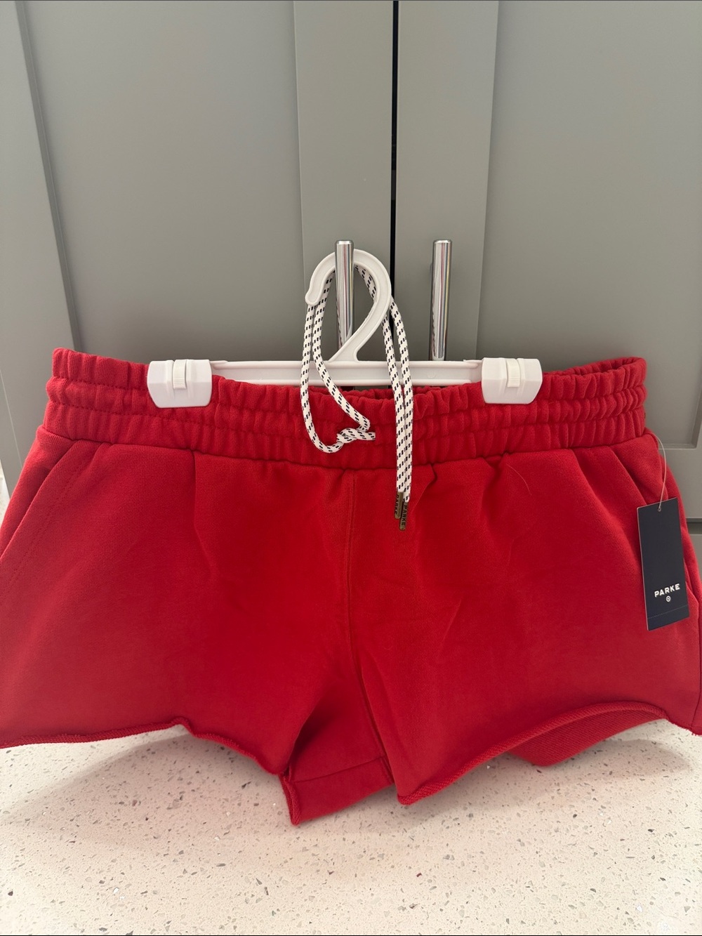 Parke red shorts with navy and white drawstring
